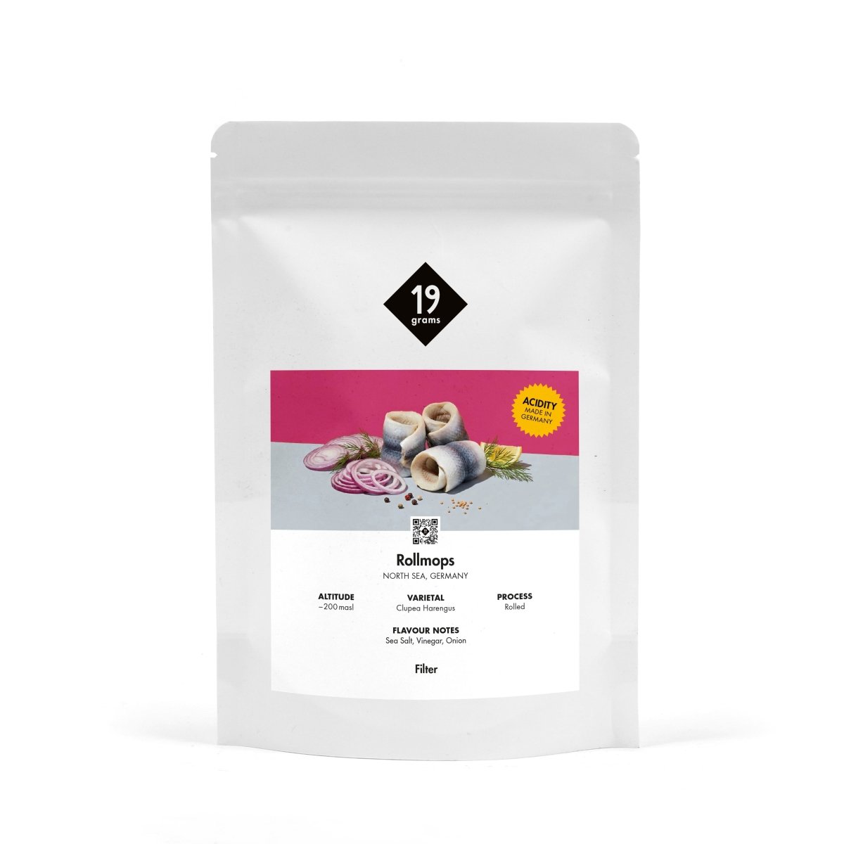 Produktmockup der 19grams Kaffeeverpackung „Rollmops" mit pinker Banderole und Rollmops-Motiv auf weißem Hintergrund