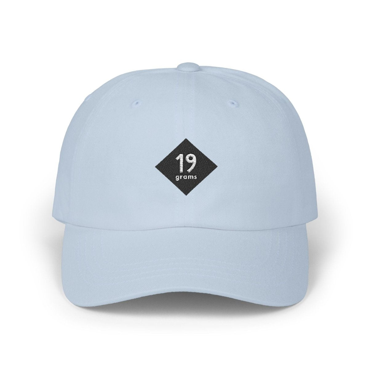 19grams Blaue Baseball Cap Frontansicht – Cap mit 19grams.live Roasters Logo, getragen von einer Person