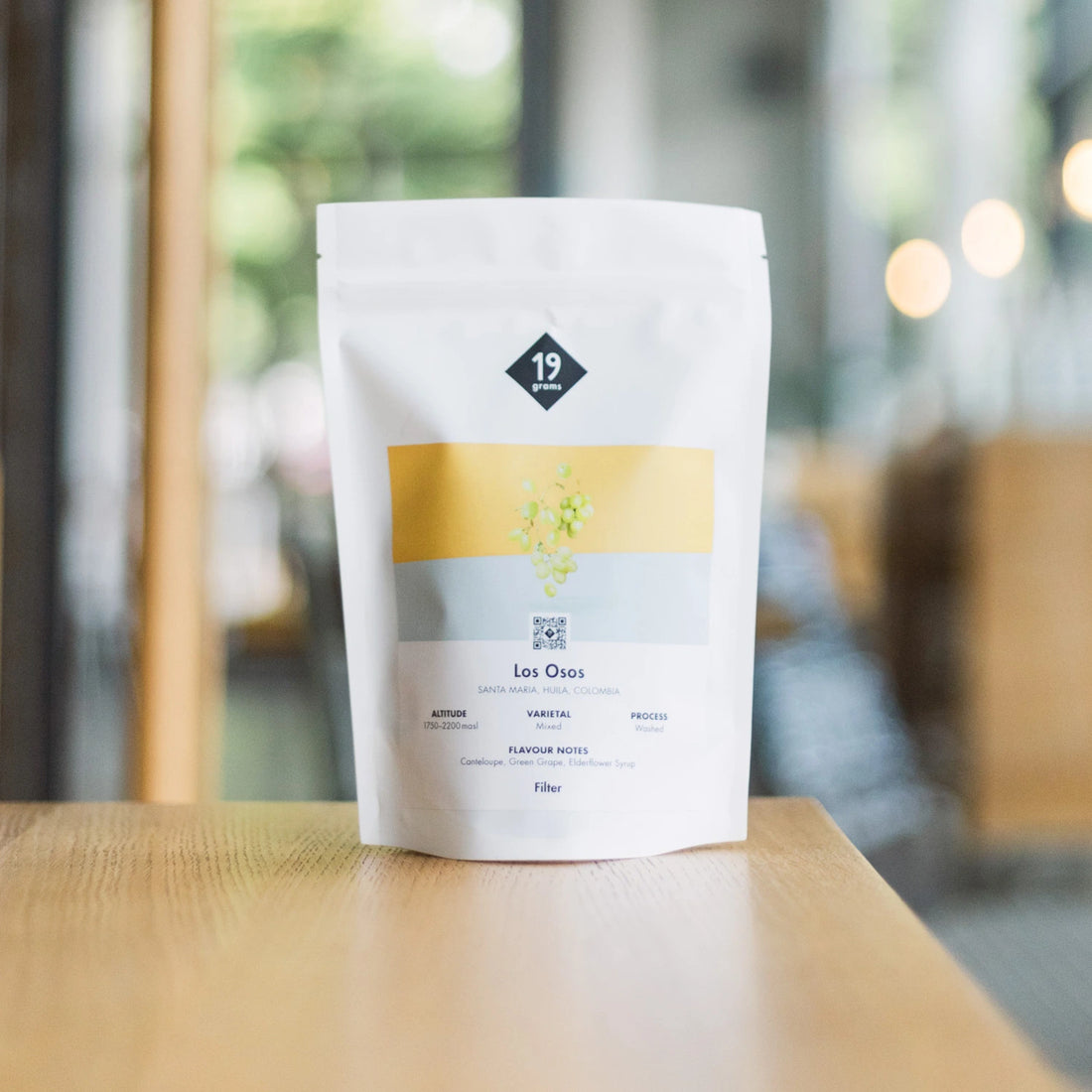 19grams Los Osos Filter Kaffeebeutel auf Holztisch – Huila Kolumbien Specialty Coffee Filter, geröstet von 19grams.live Roasters Berlin