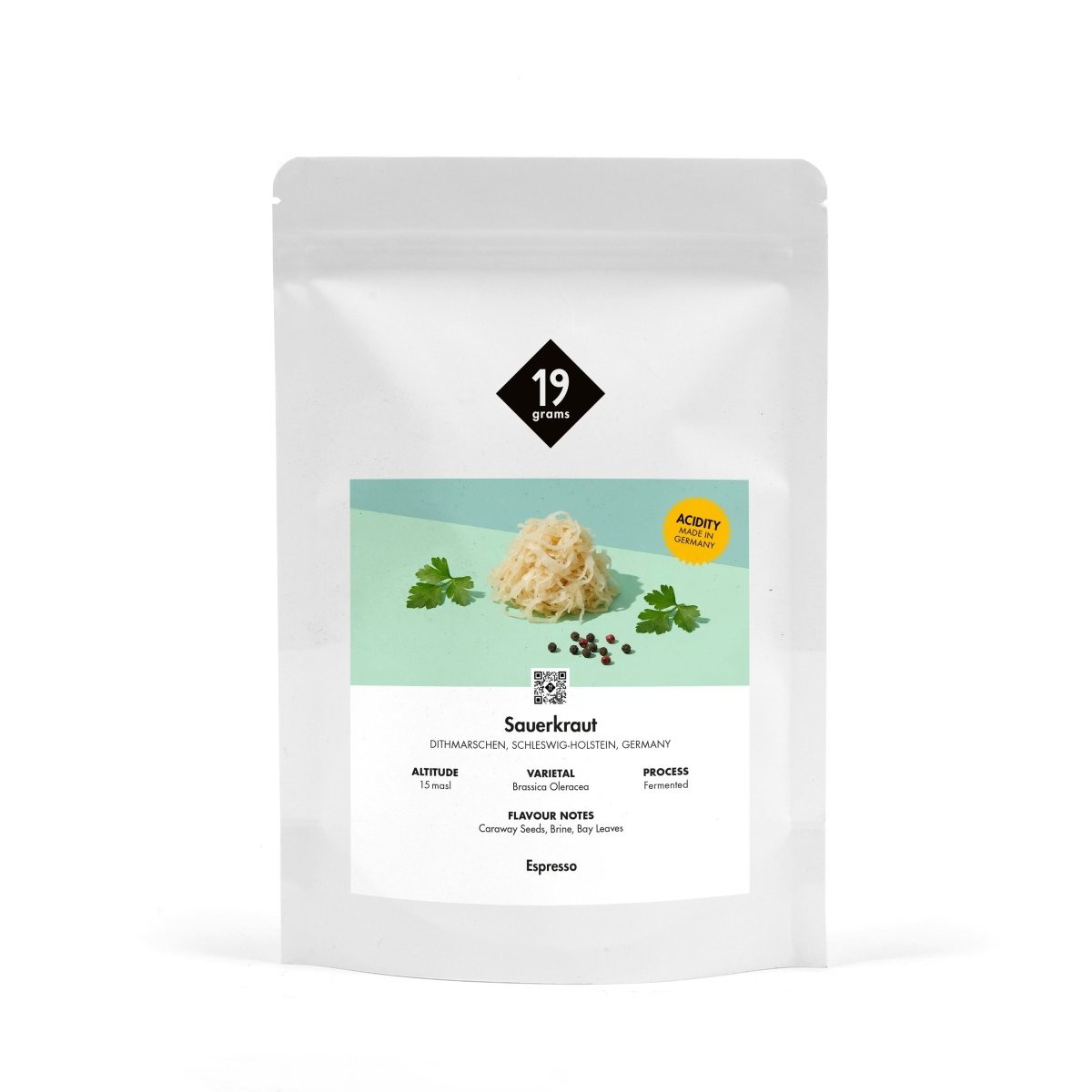Produktmockup der 19grams Kaffeeverpackung „Sauerkraut" mit mintgrüner Banderole und Sauerkraut-Motiv auf weißem Hintergrund