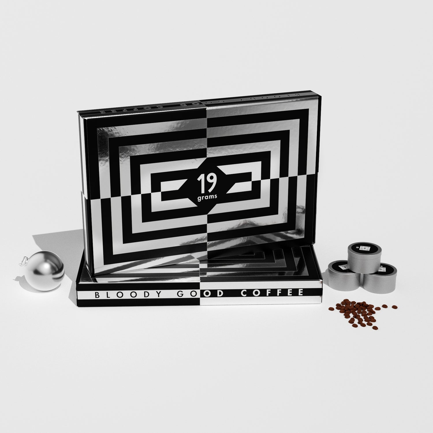 19grams Xmas in July Specialty Coffee Adventskalender Produktmockup geschlossen – Schwarz-weiße Box mit 19grams Logo, Kaffeedosen und Kaffeebohnen, Bloody Good Coffee, Kaffeerösterei Berlin
