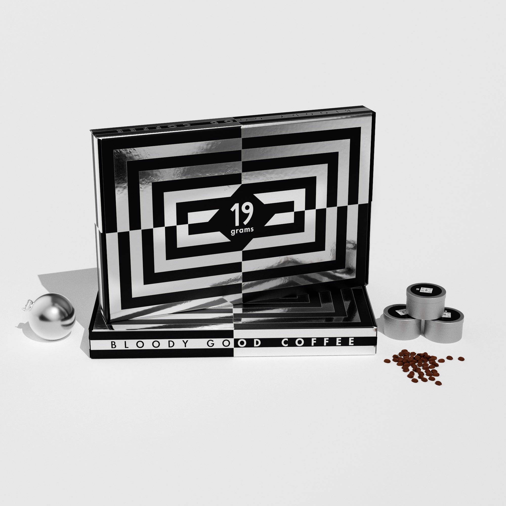 19grams Xmas in July Specialty Coffee Adventskalender Produktmockup geschlossen – Schwarz-weiße Box mit 19grams Logo, Kaffeedosen und Kaffeebohnen, Bloody Good Coffee, Kaffeerösterei Berlin